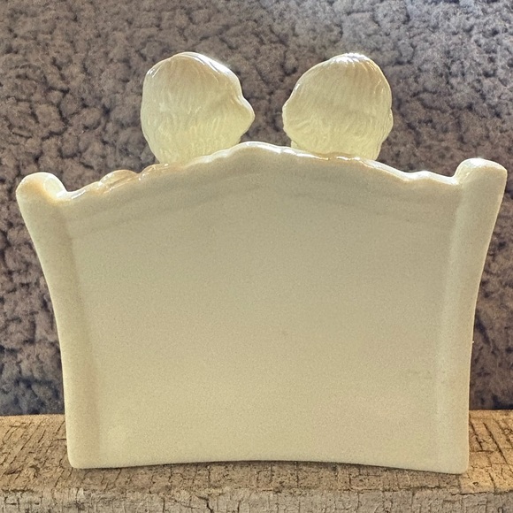 Vintage Porcelain Angel Figurine Two
Angels Sitting On a Bench - Picture 2 of 12